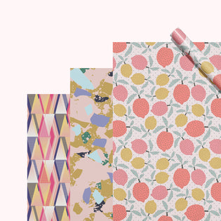  3 eco-friendly wrapping paper sheets with terrazzo, citrus fruit, and a triangle design